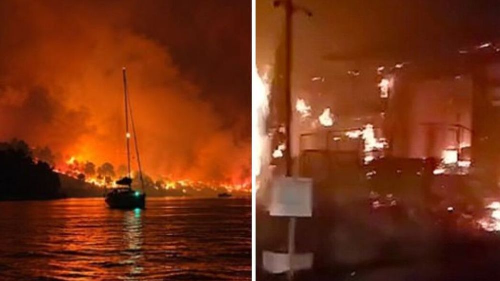 "החלטנו לרוץ": האש הגיע לריזורט באי - מאות תיירים ברחו לים